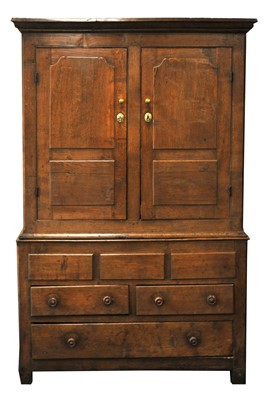 Lot 46 - A late 18th century oak livery cupboard with...