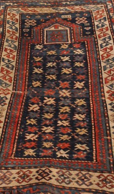 Lot 564 - Three various small old Eastern rugs