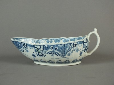 Lot 307 - Worcester 'Doughnut Tree' sauceboat, circa 1780