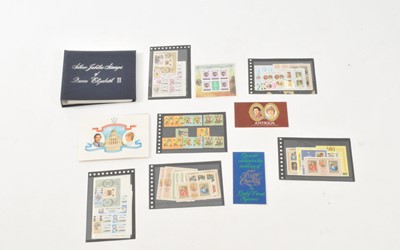 Lot 197 - A collection of Royal interest loose stamps and albums