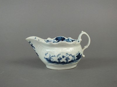 Lot 151 - Worcester 'Two Porter Landscape' sauceboat