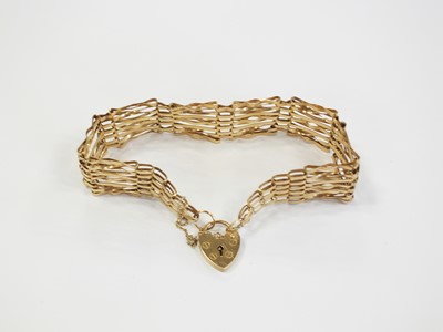 Lot 383 - A seven bar gate link bracelet