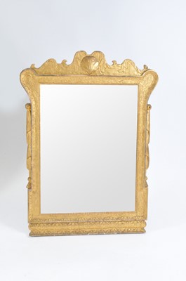 Lot 434 - An 18th century gilt carved wood and gesso framed pier wall mirror