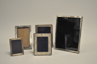 Lot 377 - A collection of five silver mounted rectangular photograph frames