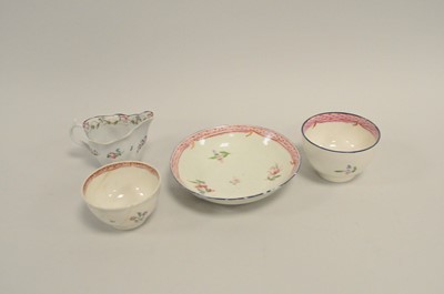 Lot 174 - Two Caughley polychrome teabowls, saucer and an early Coalport cream jug