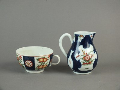 Lot 261 - Worcester 'scale blue' teacup and sparrow beak jug, circa 1775