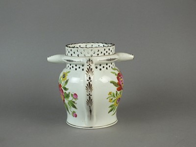 Lot 333 - Early 19th century pearlware puzzle jug