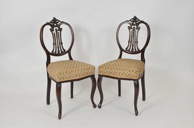 Lot 629 - A pair of mahogany dining chairs, with...