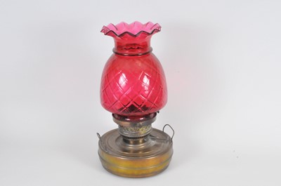Lot 303 - A large brass oil lamp, the cylindrical...