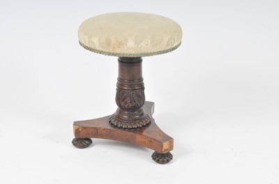 Lot 523 - A 19th century rosewood veneered piano stool...