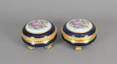 Lot 203 - A pair of Augarten Austrian circular jars and covers, on raised feet