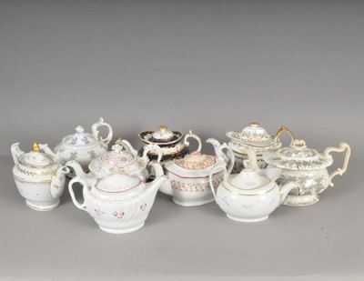 Lot 206 - Sixteen British teapots and covers, two teapot stands and one sucrier with cover