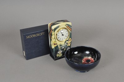 Lot 215 - A Moorcroft mantel timepiece in the 'Lamia'...