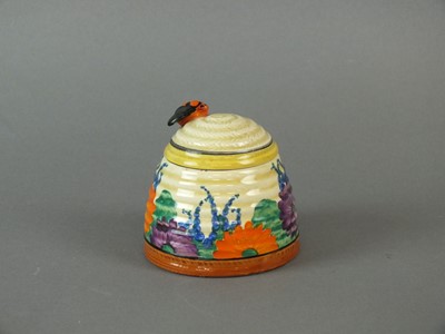 Lot 220 - Clarice Cliff honey pot and cover