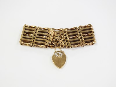 Lot 389 - A 9ct gold seven bar gate bracelet