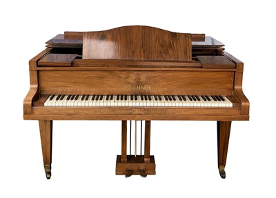 Lot 439 - A late 19th century Bluthner iron framed walnut cased boudoir grand piano