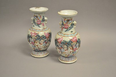 Lot 310 - A pair of Chinese export polychrome vases,...