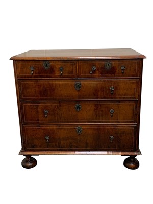 Lot 471 - A Queen Anne walnut chest of two short and...