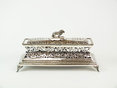 Lot 109 - A 19th century Indian white metal scroll casket