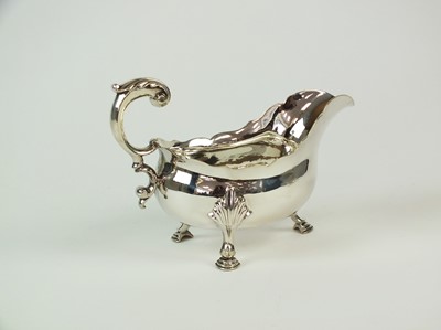 Lot 103 - An early George III silver sauce boat
