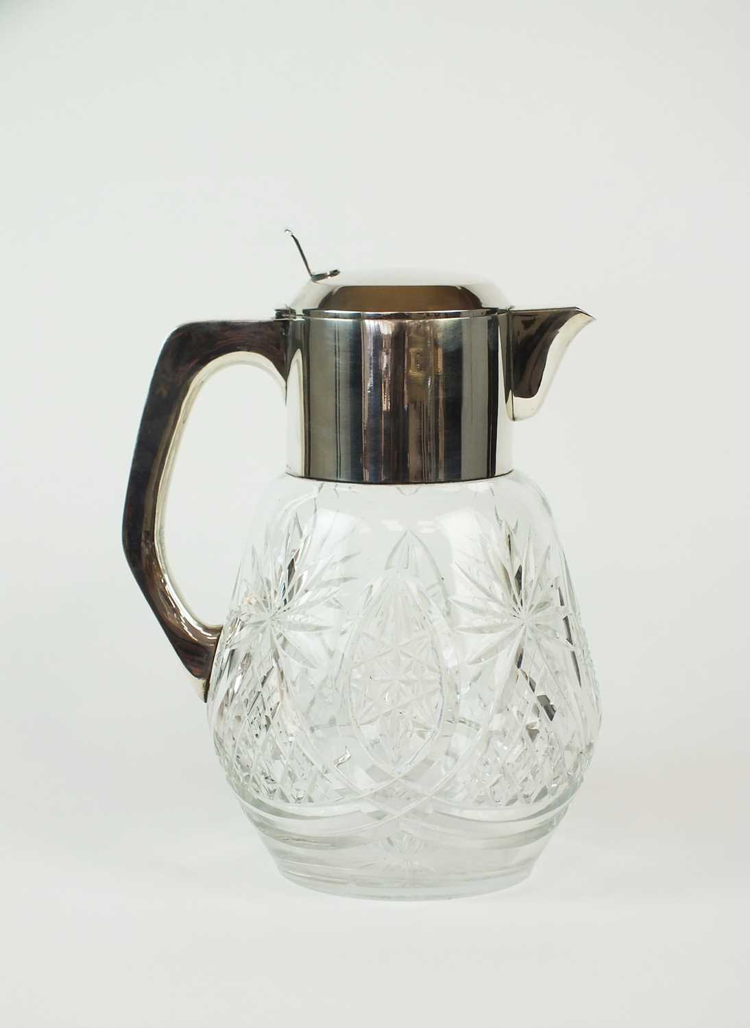 Lot 104 - A large German silver mounted glass jug