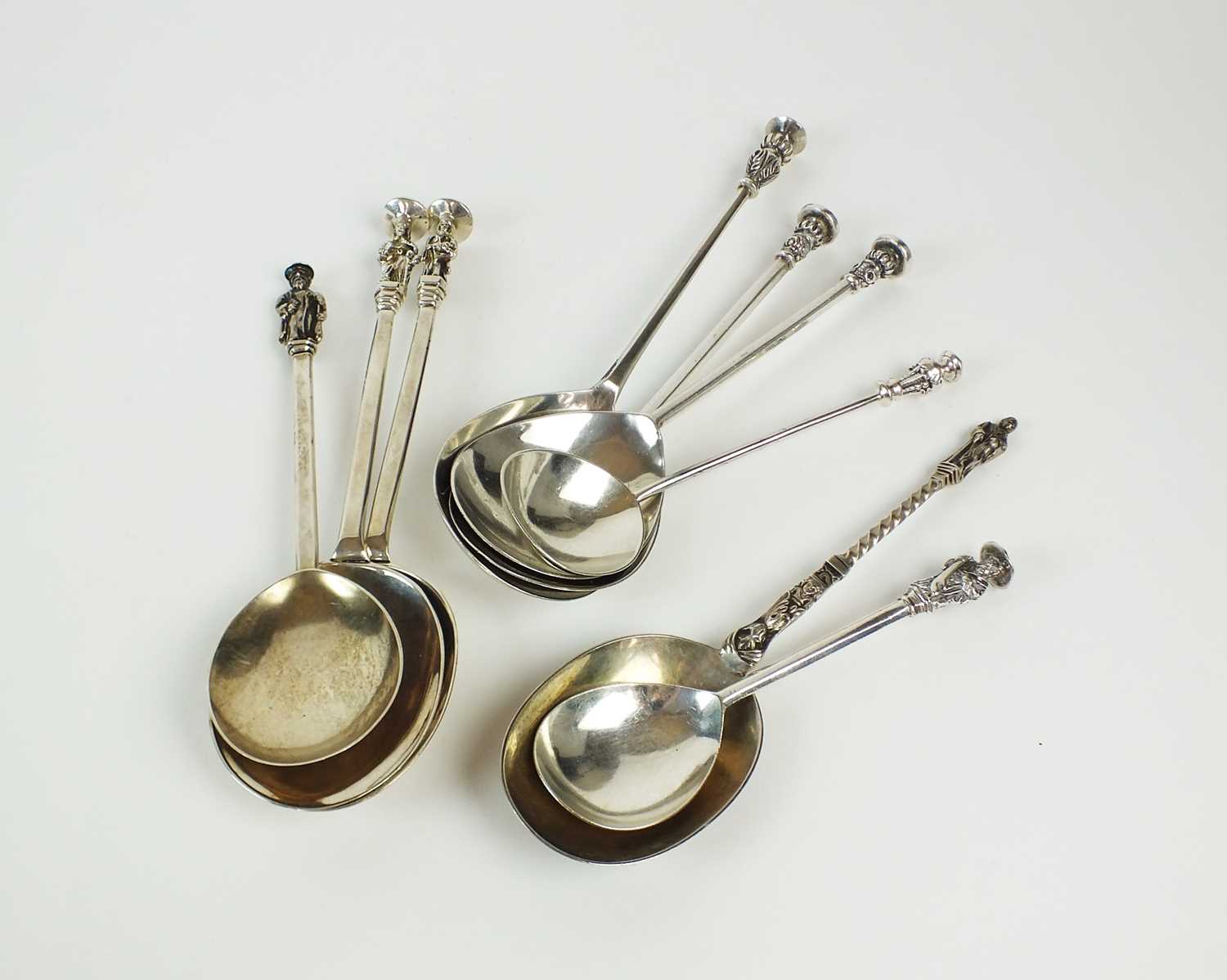 Lot 119 - A collection of seal and apostle top spoons