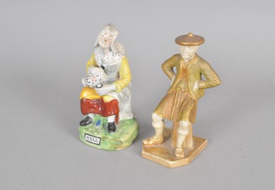 Lot 291 - A Royal Worcester 'Scotsman' figure and a Staffordshire figure of Nell