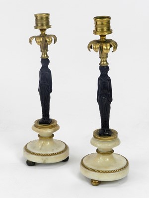 Lot 482 - A pair of Regency bronze, gilt bronze and...