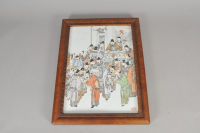 Lot 323 - A framed Chinese porcelain panel, decorated...