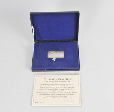Lot 335 - A Danbury Mint commemorative silver Concorde ingot