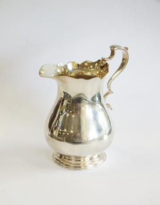 Lot 82 - A silver cream jug