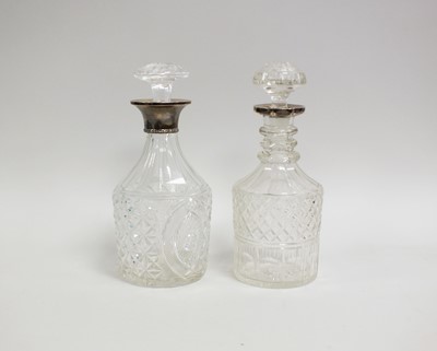 Lot 83 - A silver mounted cut glass decanter
