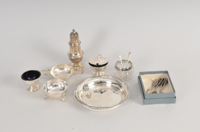 Lot 375 - A silver tea strainer on stand