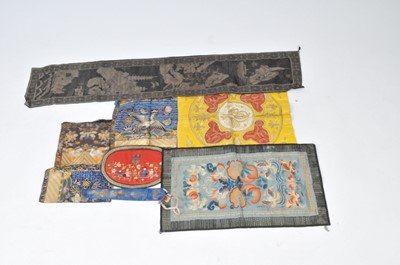 Lot 317 - A collection of Chinese textiles to include an...