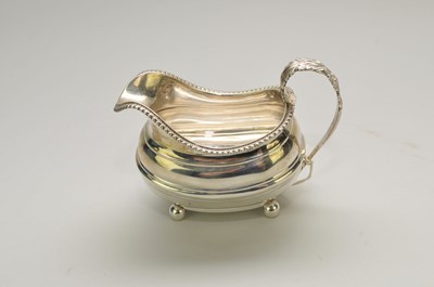 Lot 91 - A George III silver cream jug