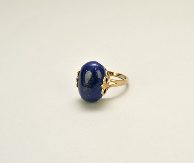Lot 112 - A 9ct gold lapis lazuli dress ring