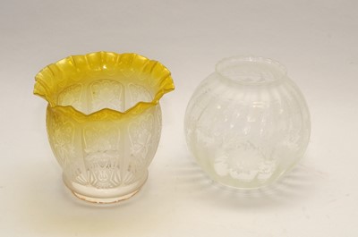 Lot 298 - A uranium yellow tinted etched glass lamp...