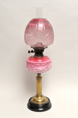 Lot 299 - A Victorian oil lamp, with a fluted brass...