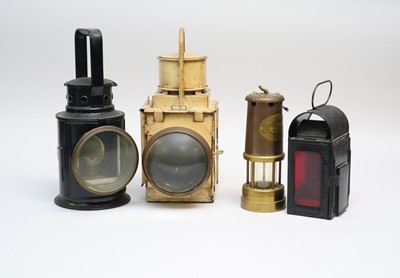 Lot 273 - Three various railway lanterns, the largest...