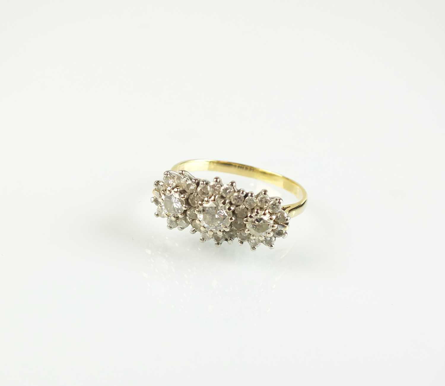 Lot 84 - An 18ct gold diamond cluster ring