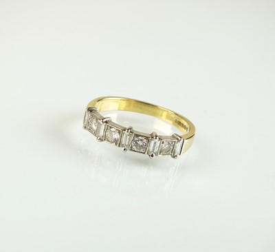 Lot 100 - An 18ct gold diamond half hoop eternity ring