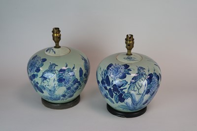 Lot 262 - A decorative pair of blue and white desk lamps,...
