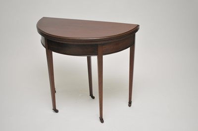 Lot 356 - A demi-lune mahogany card table, 76 cm high,...