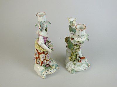 Lot 246 - A pair of Derby porcelain candlesticks, circa 1760
