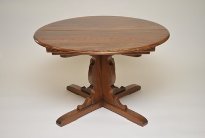 Lot 340 - A 20th century Ercol extending dining table,...