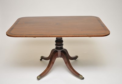 Lot 348 - A mahogany breakfast table, with rounded...