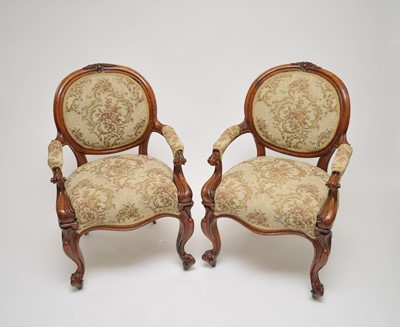 Lot 350 - A pair of Victorian upholstered oak elbow...