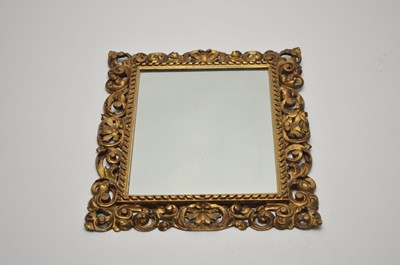 Lot 345 - A Florentine type framed wall mirror, with...