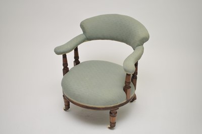 Lot 351 - An Edwardian upholstered tub chair. with...