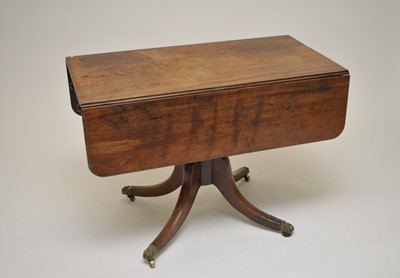 Lot 324 - A 19th century mahogany sofa table, raised on...